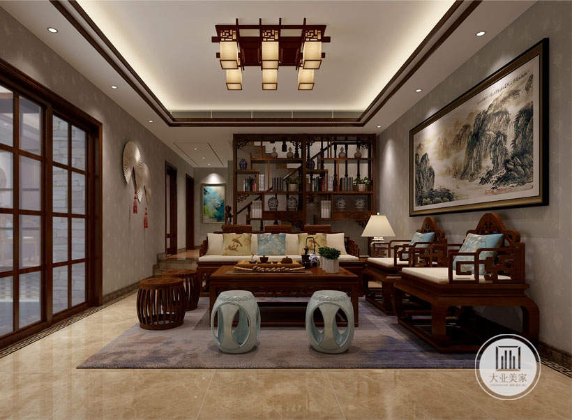 半围合式的茶室，家居采用的是中式，与楼上的欧式  风格做区别，背有山河壮丽图，有情有景，也是茶室的  一个点缀。